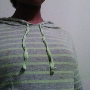 A light green and grey stripped long sleeve hoodie